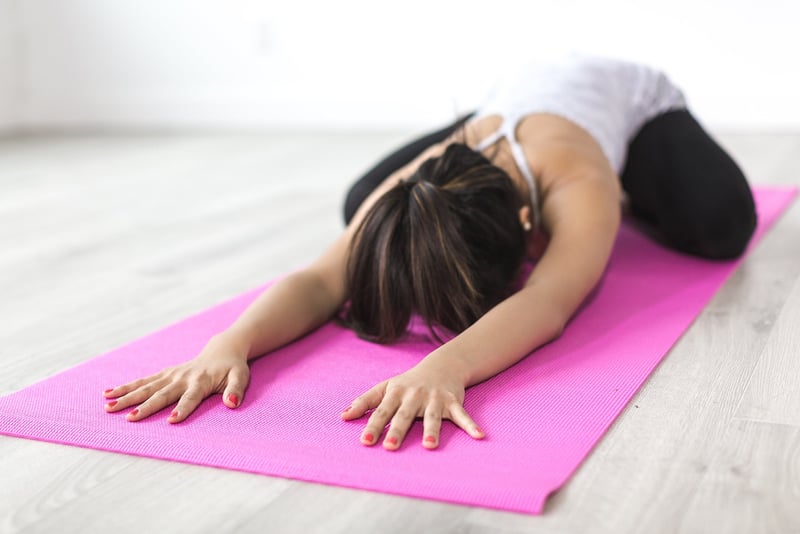 Yoga poses on the beach